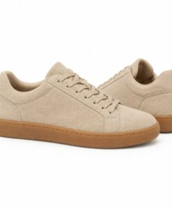 Pair of women's beige suede-look low-top sneakers with gum sole standing, side profile and back heel view