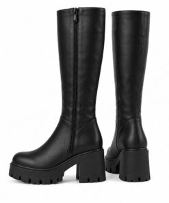 Pair of women's black vegan leather knee-high platform boots with lug sole standing, side profile and back heel view