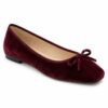 Single women's burgundy velvet square toe ballet flat on a white background