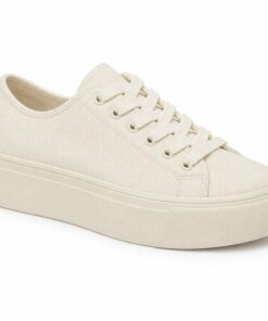 Single women's cream low-top platform canvas sneaker on a white background