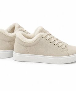 Pair of women's cream suede-look low-top sneakers with faux fur collar standing, side profile and back heel view