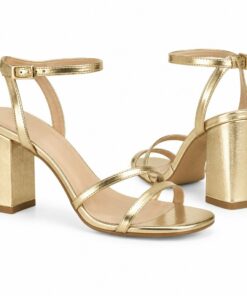 Pair of women's metallic gold strappy sandals with 3 inch block heel standing, side profile and back heel view