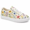 Single women's ivory wildflower print low-top canvas sneaker on a white background
