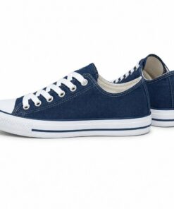 Pair of women's navy blue classic low-top canvas sneakers standing, side profile and back heel view