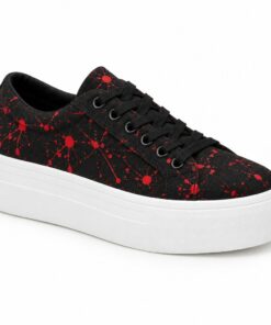 Single women's black and red paint splatter low-top platform sneaker on a white background