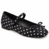 Single women's black and white polka dot Mary Jane flat on a white background