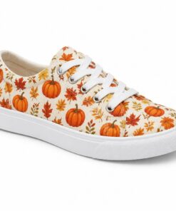 Single women's pumpkin print low-top canvas sneaker on a white background