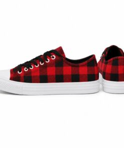 Pair of women's red buffalo check low-top canvas sneakers standing, side profile and back heel view