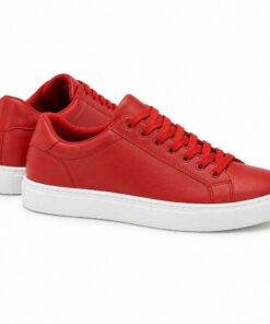 Pair of women's red smooth vegan leather low-top sneakers standing, side profile and back heel view